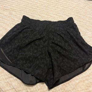 Lululemon CHEETAH black shorts size 4 they are a 4 inch